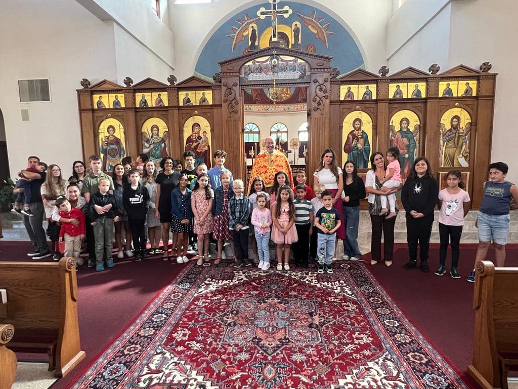 Photo of church school kids with Father George
